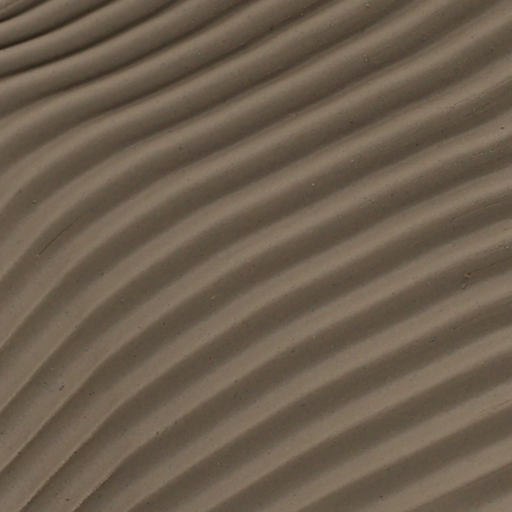 Close-up of evenly spaced, wavy ridges on a smooth, brown surface creating a textured pattern.