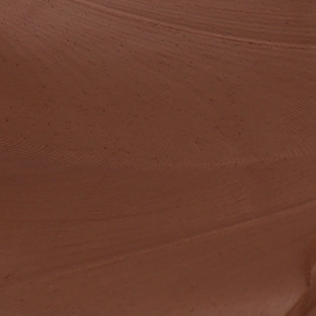 Close-up image of a smooth, reddish-brown surface with subtle texture and natural variations.